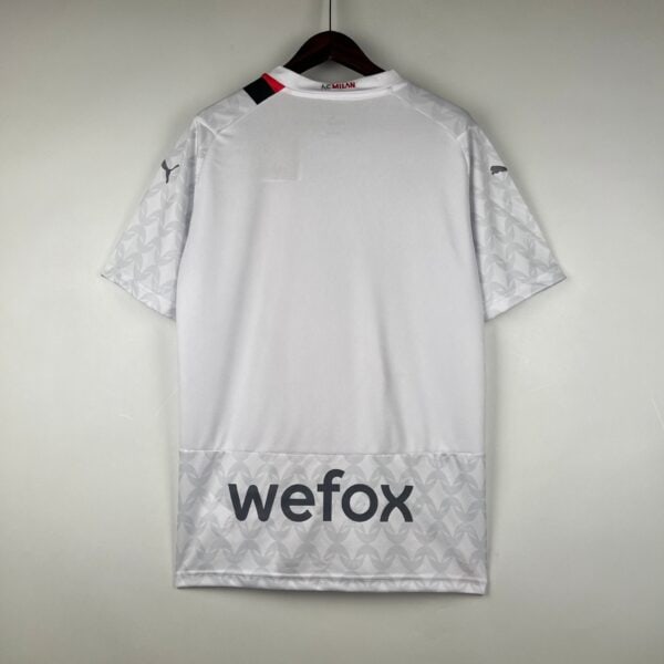 Authentic football jersey with "wefox" sponsor and Puma logo, perfect for sports fans and players.