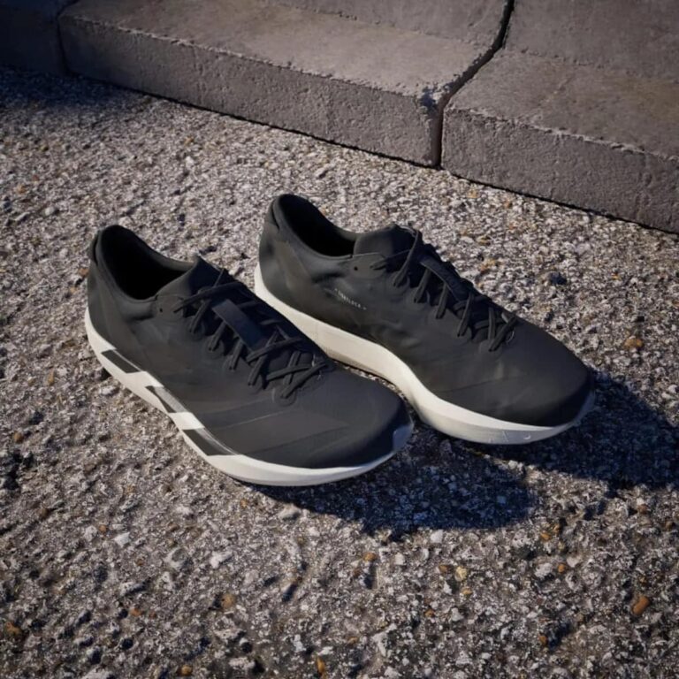 Adidas Adizero Adios 9 lightweight running shoes for speed and performance. Perfect for athletes and.