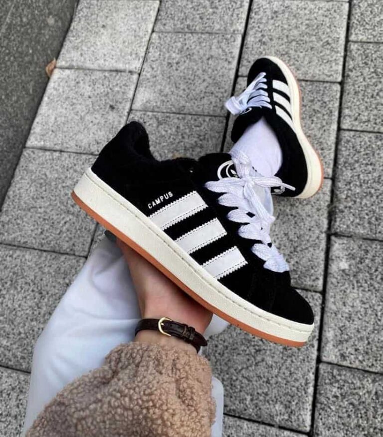 Adidas Campus 00s sneakers in black and white with classic three stripes and "CAMPUS" branding.