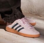 Adidas Handball Spezial sneakers in clear pink with black stripes and gum sole.
