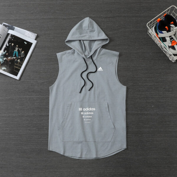 Grey Adidas hoodie vest with front pocket and drawstring hood, perfect for sports and casual wear.