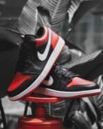 Authentic Air Jordan 1 "Alternate Bred Toe" with black, red, and white colorway for basketball and s.