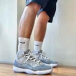 Air Jordan 11 Cool Grey 2022 basketball shoes with grey and white design, iconic style, and premium.