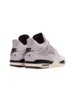 Air Jordan 4 Fossil Stone sneakers with white and black accents, iconic design, and premium material.