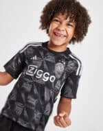 Kids football kit AJX third 2023/24, authentic sportswear for young football fans.