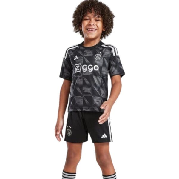 Kids football kit Ajax third 2023/24, authentic sportswear for young players.