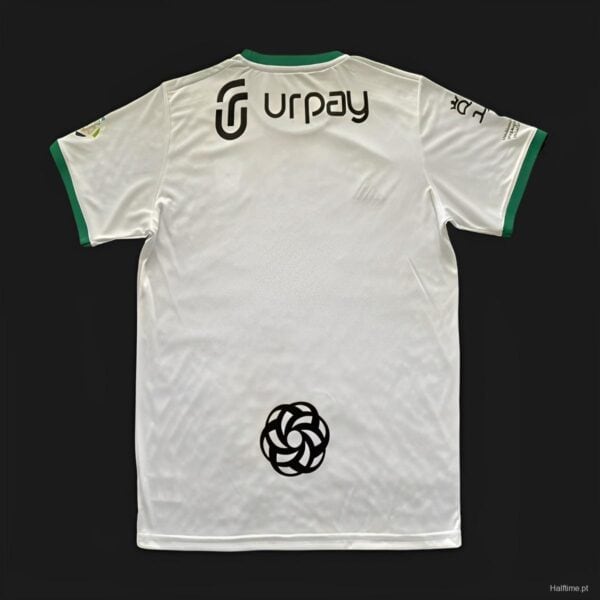 Al-Ahli Saudi away soccer jersey with green accents and sponsor logos. Perfect for fans supporting t.
