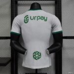 Al-Ahli Saudi away soccer jersey with Urpay logo, lightweight fabric, and team emblem. Perfect for f.