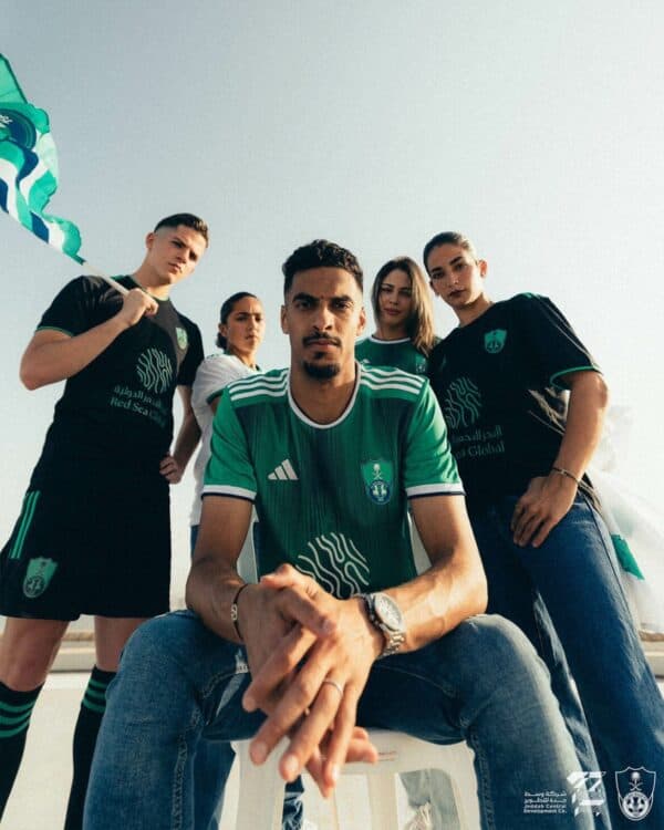 Al-Ahli Saudi home fans soccer jersey 24, featuring team logo and vibrant green color, perfect for p.