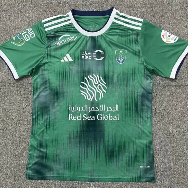 Al-Ahli Saudi football jersey for fans, green color, official team logo, and sponsor details.