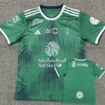 Official Al-Ahli Saudi football jersey for fans, green color, with team logos and sponsor details.
