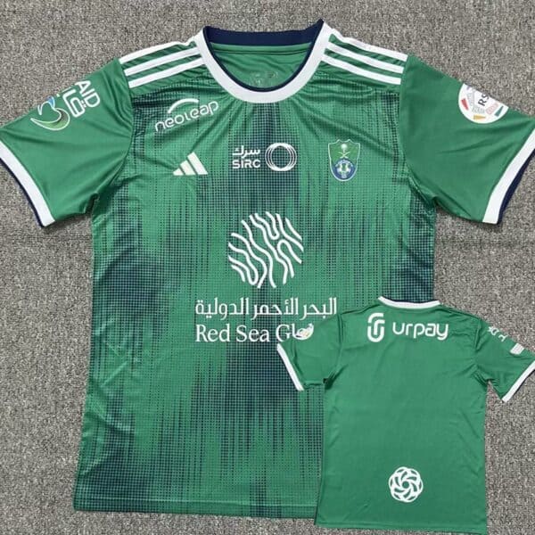Official Al-Ahli Saudi football jersey for fans, green color, with team logos and sponsor details.
