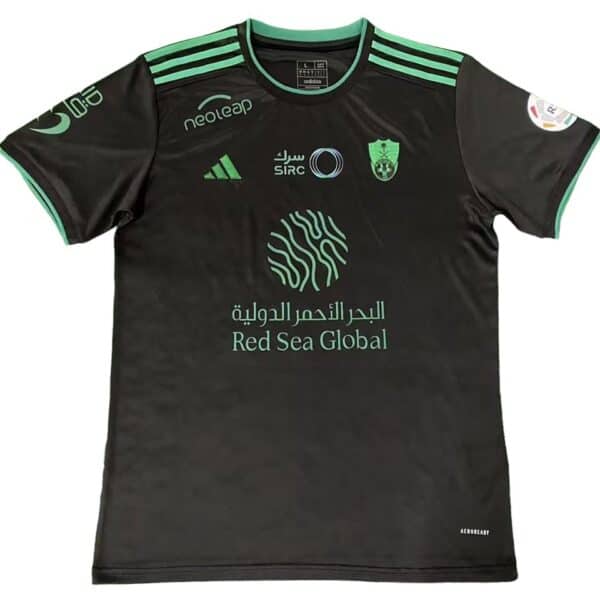 Al-Ahli Saudi third football jersey for fans, black with green accents, featuring team logos and spo.
