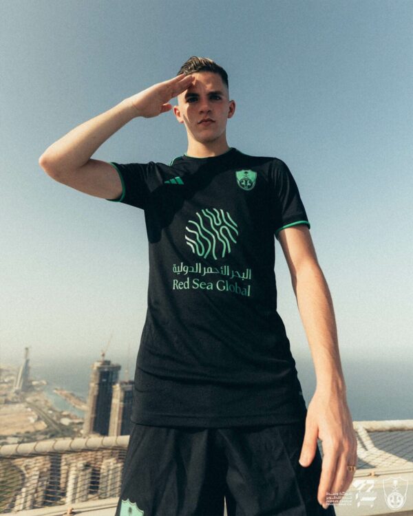 Al-Ahli Saudi third soccer jersey with player number 24, featuring team logo and modern design.
