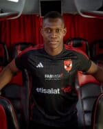 Al Ahly SC away football jersey for 2023-2024 season, featuring team logo and sponsor details.