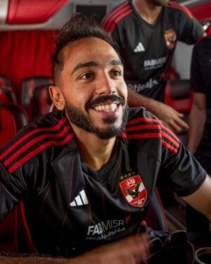 Al Ahly SC away football jersey for 2023-2024 season, featuring team logo and stylish design.