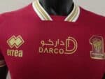 Al-Ittihad away football jersey 2022/23 with team logos and sponsor details.