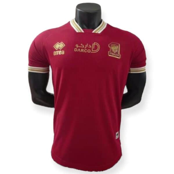 Al-Ittihad away football jersey 2022/23 with team logo and gold accents.