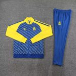 Al Nassr blue training jacket and pants set for 2022/23 season, authentic sportswear for football tr.