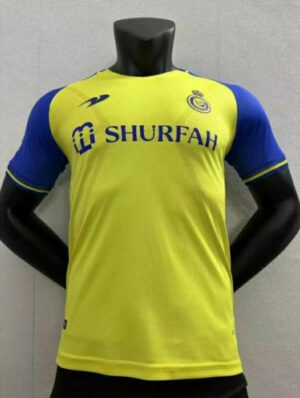 Al Nassr home player version jersey with Ronaldo 7, yellow and blue design.