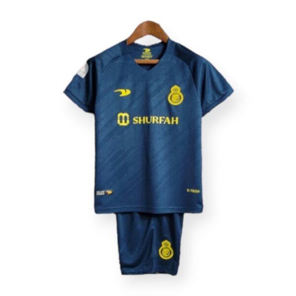 Al-Nassr youth away football kit 2022/23 with team logo and sponsor details.