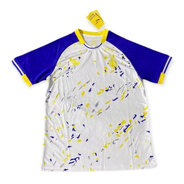 AL Nassr 2023/24 training jersey with yellow and blue design, ideal for sports fans and athletes.