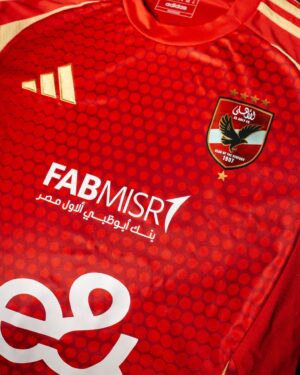 Al Ahly Kids Home Football Kit 2024/25 with team logo and vibrant red design.