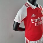 Kids Arsenal Home Football Kit 2022/23 with Red and White Design.