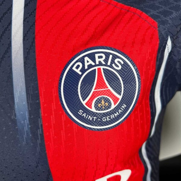 PSG 2023/24 home football jersey with Paris Saint-Germain logo and design details.