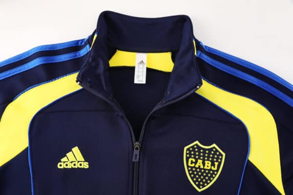 Official Boca Juniors football jacket with club crest, navy blue and yellow design.