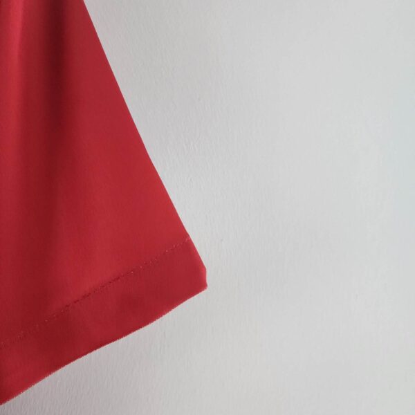 Close-up of Portugal 2022 Ronaldo World Cup football jersey fabric.