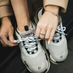 Close-up of Balenciaga Triple S sneakers with laces and size 37 label.