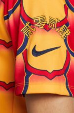Pre-Match BRC Gold Jersey 2024 with Nike logo and vibrant design.
