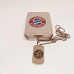 FC Bayern Munich logo keychain with tin box, official merchandise.