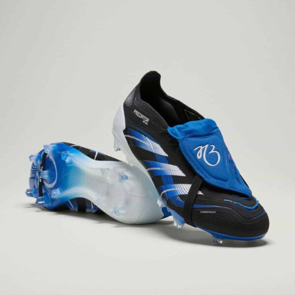High-performance Predator Elite JB firm ground football boots with dynamic design.