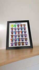 Framed collage of football team jerseys at UAE SPORT STORE.