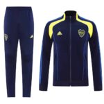 Authentic Boca Juniors football training suit for 2025/26 season. Blue and yellow tracksuit with clu.