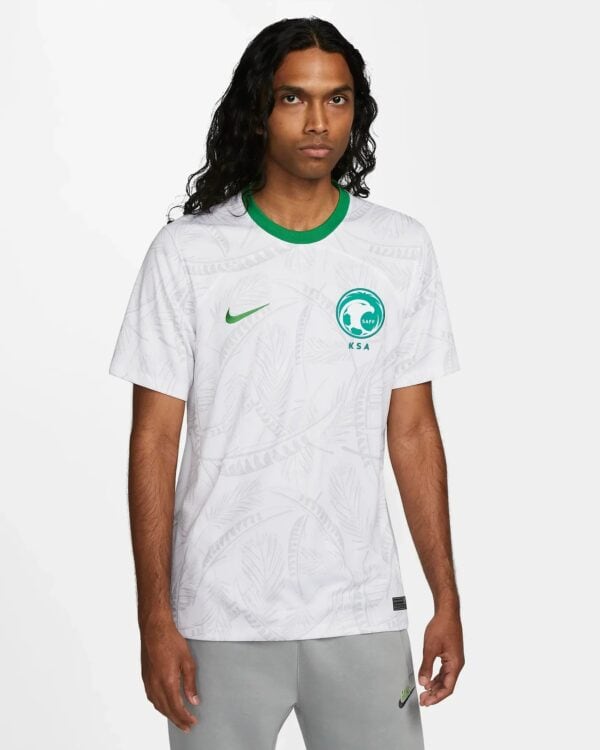 Saudi Arabia football jersey with green collar and team logo.