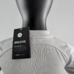 White Nike Breathe kids soccer jersey for PSG 2022/23 away kit.