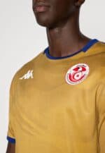 Tunisia national football team jersey with logo and blue accents.