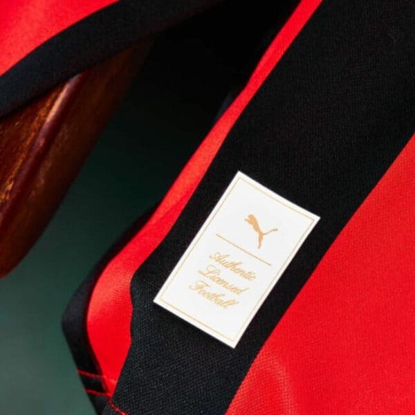Puma authentic football backpack with logo and red-black design.