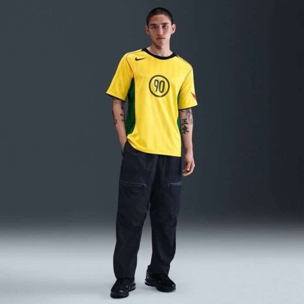 Nike Total 90 yellow soccer jersey for men, lightweight and breathable sportswear.