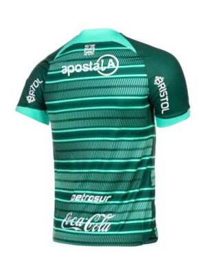 Olimpia third football jersey 2023/24 with green and teal stripes, featuring sponsor logos.