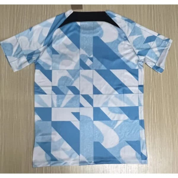 Pumas third jersey 2024 with geometric blue and white pattern.