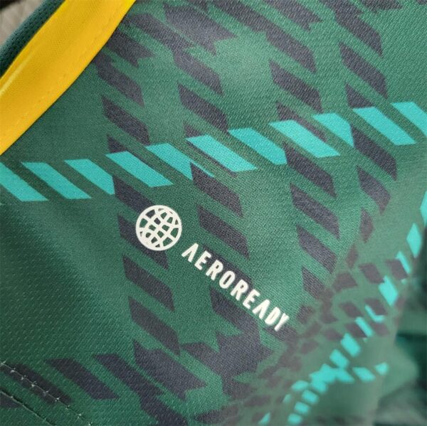 Authentic Portland Timbers 2023/24 home football jersey with vibrant green and black design.