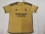 Authentic Real Madrid away football jersey 2023/24, yellow with black accents, official club merchan.