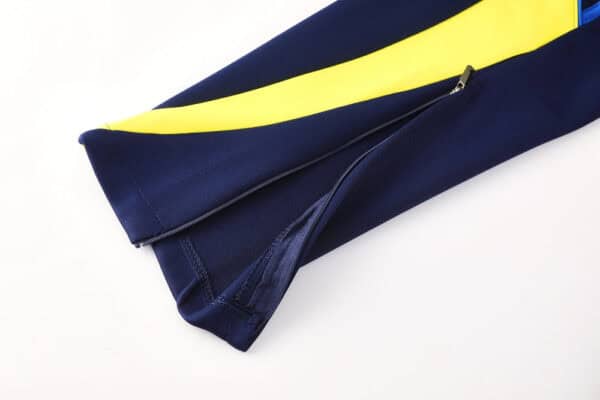 Authentic Boca Juniors football jacket with yellow and navy design, perfect for fans and sportswear.