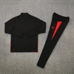 Portugal black training tracksuit for World Cup 2026, includes top and pants with red accents.