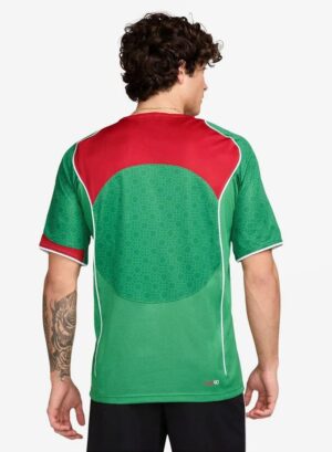 Nike Total 90 men's soccer jersey in vibrant green and red, perfect for football fans and players.