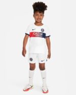 Kids PSG away football kit 2023/24 featuring jersey, shorts, and socks for young fans.